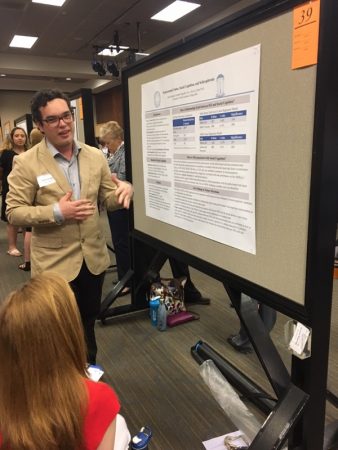Penn Lab undergraduate Austin Gragson presents his research at UNC psychology poster session, Spring 2017
